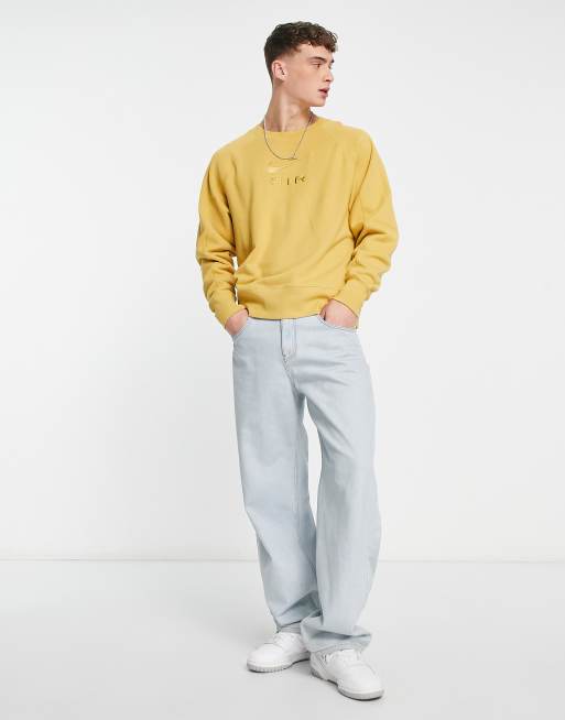 Nike color oro on sale