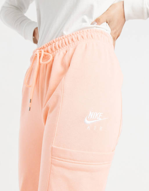 Nike Air fleece joggers in peach ASOS