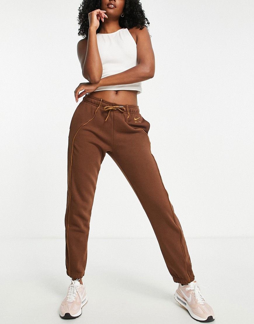 Nike Air fleece sweatpants in brown - BROWN