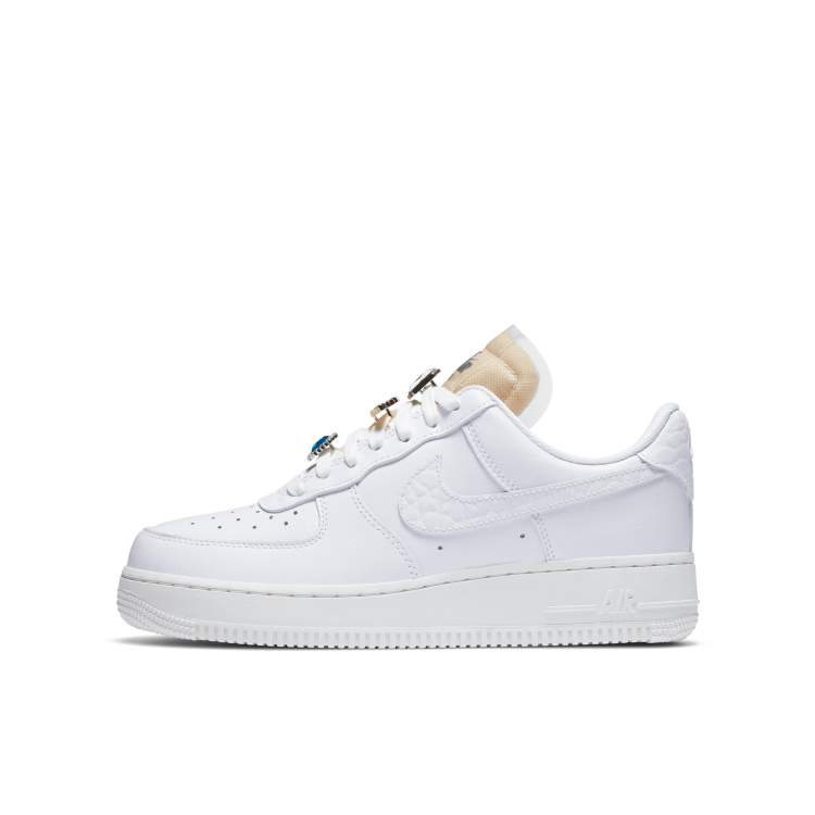 Nike Air Force 1 '07 40th anniversary sneakers in off-white and red