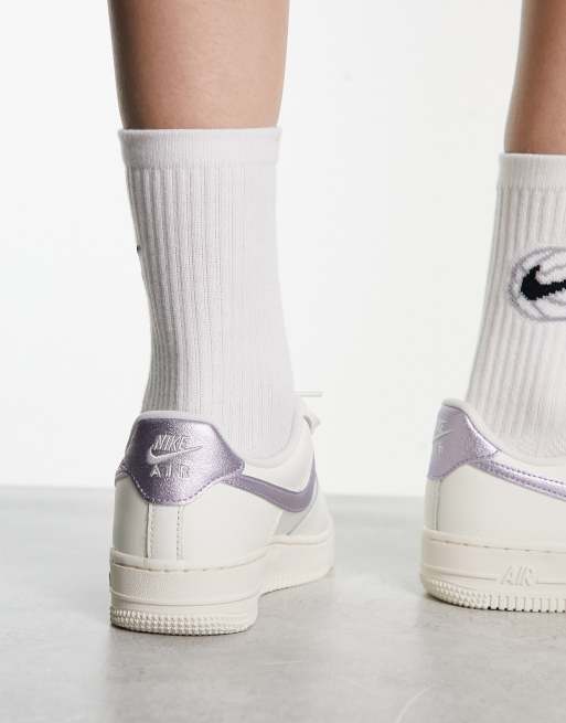 Nike Air Force 1 07 ESS sneakers in triple white and lilac