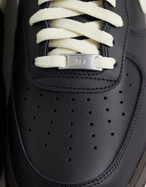 Nike Air Force 1 '07 ESS trainers in black & brown, 4 of 5