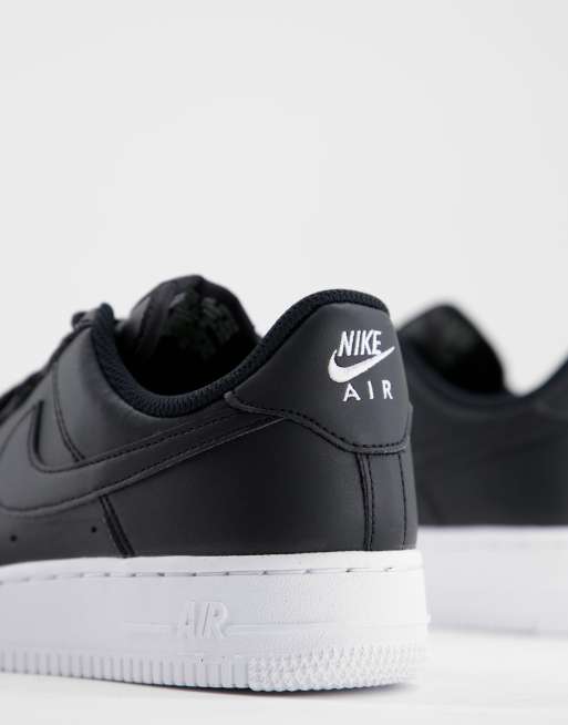 Nike Air Force 1 07 essential trainers in black with white sole