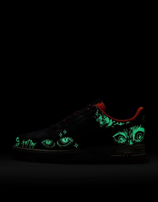 Nike Air Force 1 07 glow in the dark trainers in black and orange