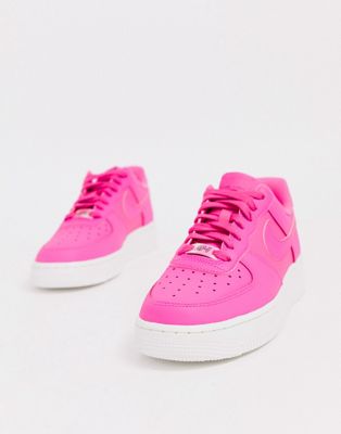 neon pink nike trainers