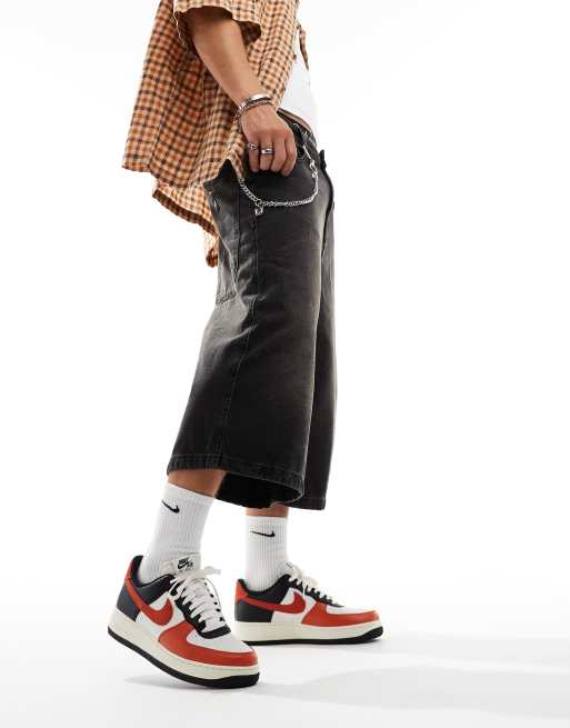 Nike – Air Force 1 '07 LV8 – Biało-czarno-pomarańczowe buty sportowe, 4 z 5