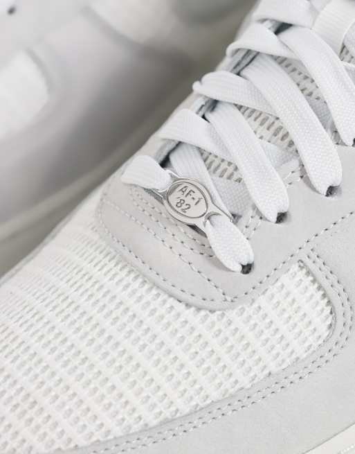 Nike - Air Force 1 '07 LV8 - Hvide og grå sneakers i vævet materiale, 4 af 5