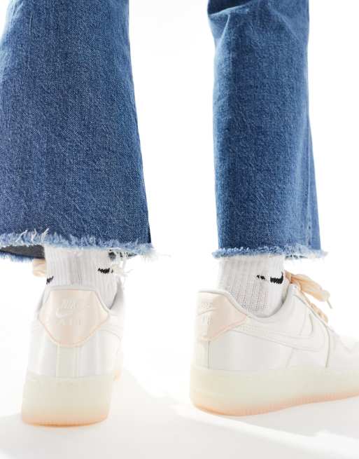 Nike Air Force 1 '07 LV8 ribbon sneakers in white and pink