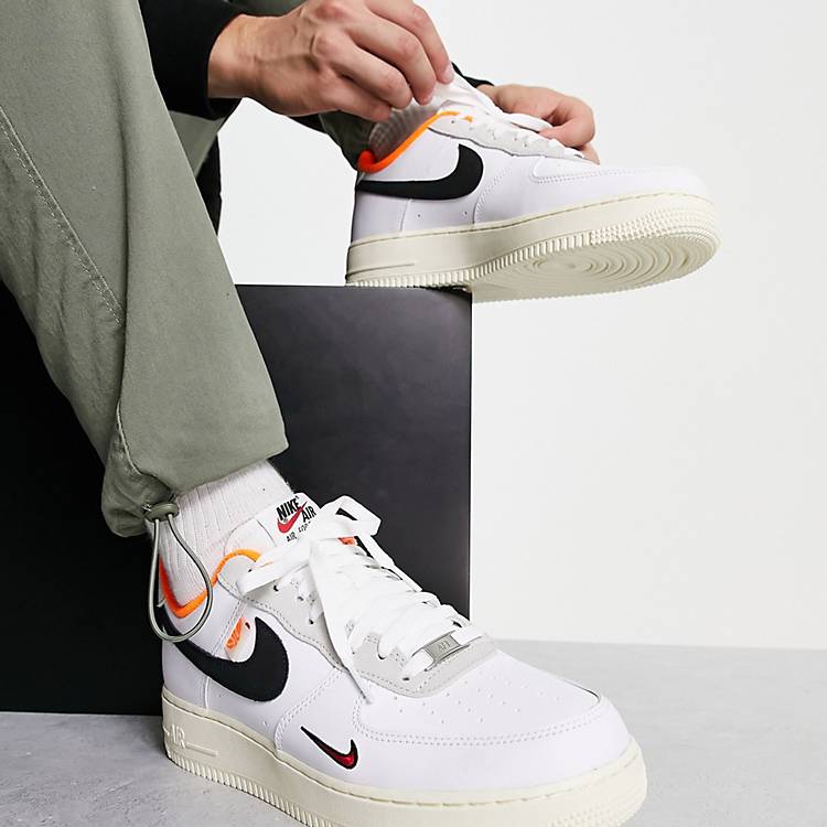 Carelessness factor Usually Nike Air Force 1 '07 LV8 sneakers in white, black and orange | ASOS