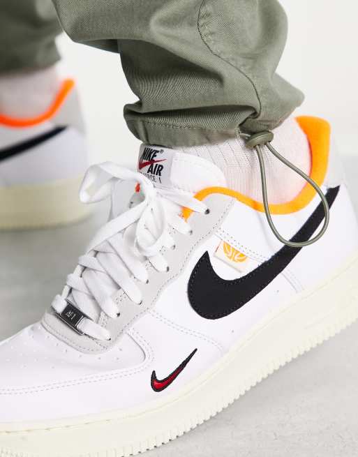 Nike Air Force 1 '07 LV8 sneakers in white, black and orange