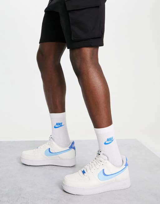 Nike Air Force 1 07 LV8 trainers in white and blue ASOS