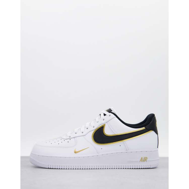 Nike Air Force 1 07 LV8 trainers in white and gold