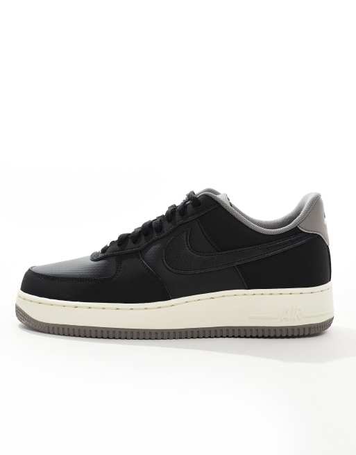 Nike Air Force 1 07 LV8 winter trainers in black and grey