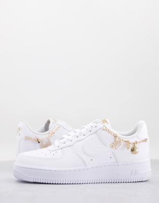 Nike Air Force 1 '07 LXX trainers in white with gold jewellery