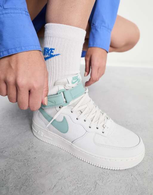 Nike Air Force 1 '07 Mid trainers in white and mineral blue