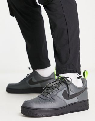Nike Air Force 1 '07 trainers in grey and black volt - ASOS Price Checker