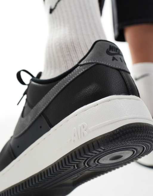 Nike Air Force 1 '07 sneakers in black and gray