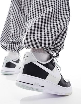 Nike Air Force 1 '07 sneakers in black and off white | ASOS