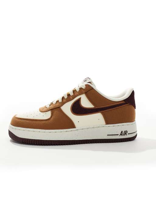 Nike Air Force 1 07 sneakers in brown and off white