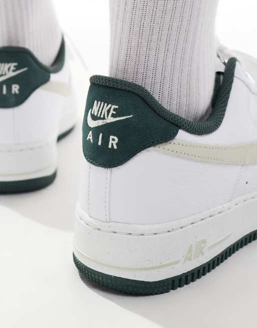 Nike Air Force 1 07 sneakers in white and dark green