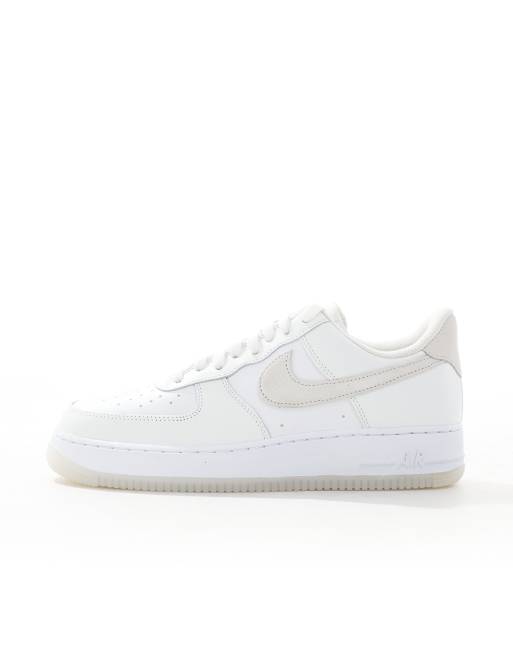 Nike Air Force 1 07 sneakers in white and light gray