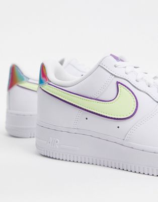 green and purple nike shoes