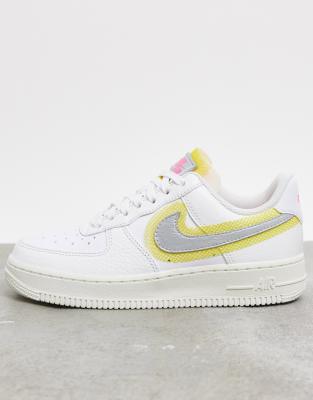 nike white and silver trainers