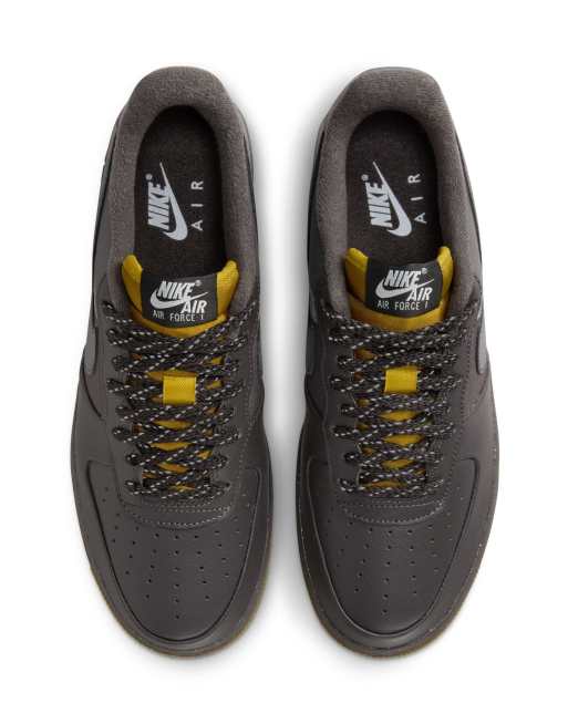 Nike Air Force 1 07 trainers in black and brown ASOS