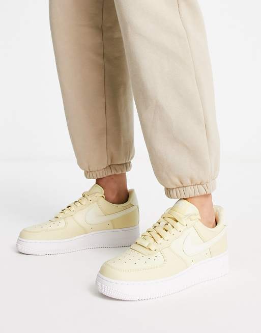 Nike Air Force 1 07 trainers in lemon drop ASOS