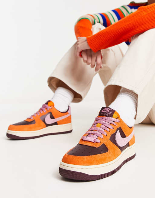 Nike Air Force 1 07 trainers in orange and burgundy