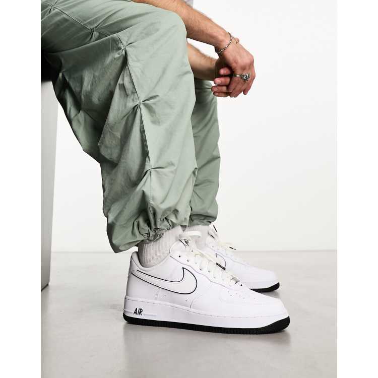 Nike Air Force 1 '07 trainers in white and black outlined | ASOS