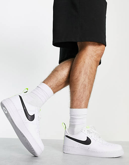 Nike Air Force 1 '07 trainers in white and black volt | ASOS