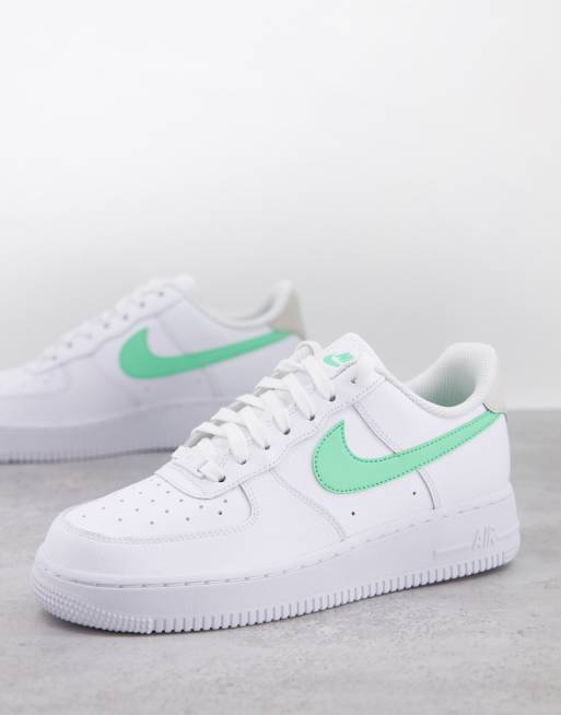 Nike Air Force 1 07 trainers in white and green glow