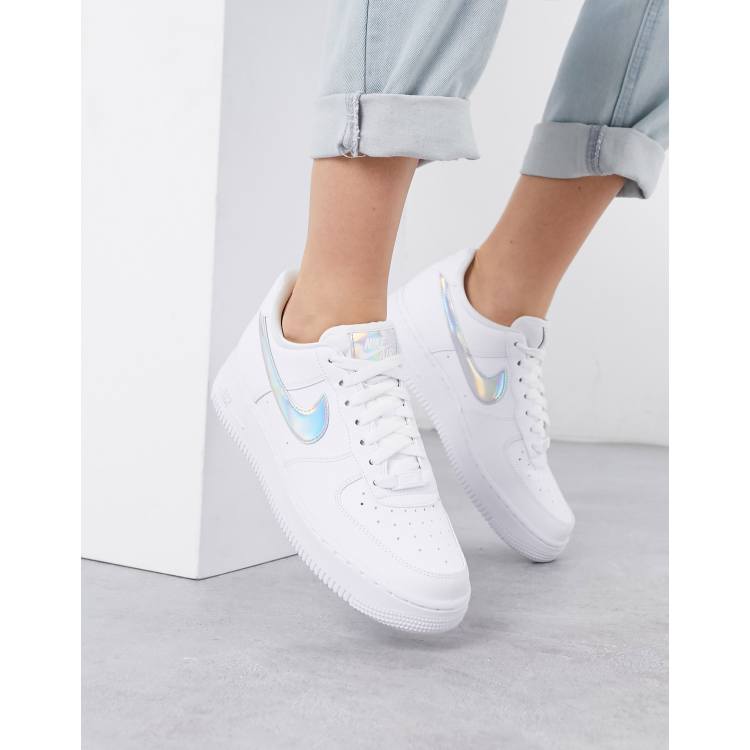 Nike Air Force 1 07 trainers in white and metallic silver