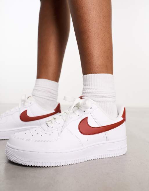 Nike Air Force 1 '07 trainers in white and rust orange