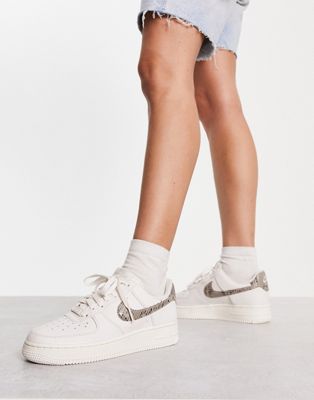 Nike Air Force 1 '07 trainers in white and snake print