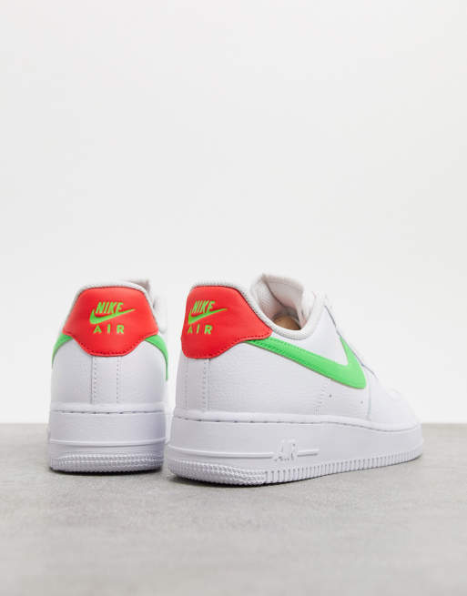 Nike Air Force 1 07 trainers in white with neon swoosh