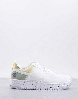 Nike Air Force 1 Crater trainers in white and orange