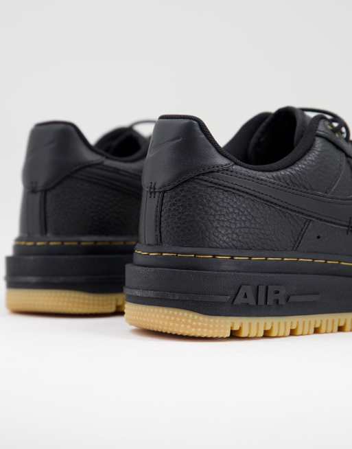 Nike Air Force Luxe trainers in black with gum sole ASOS