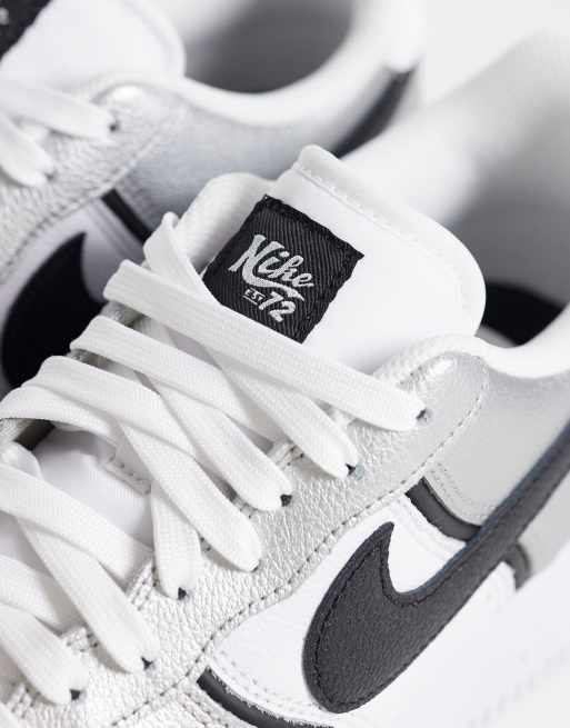 Nike Air Force 1 LV8 trainers in metallic and black, 4 of 5