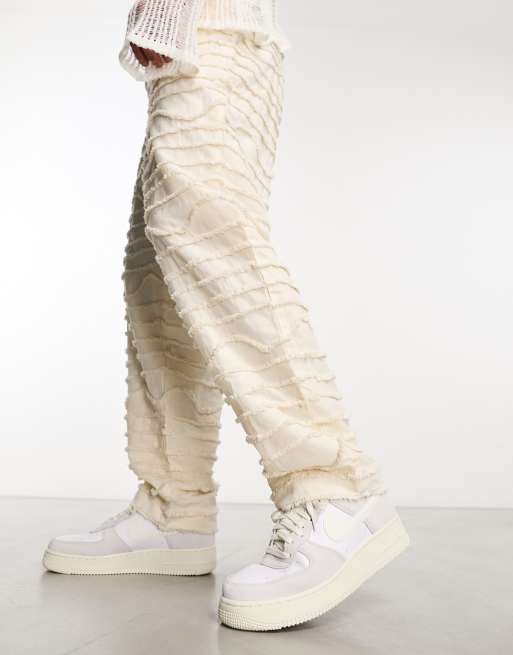 Nike air force 1 lv8 store white trainers