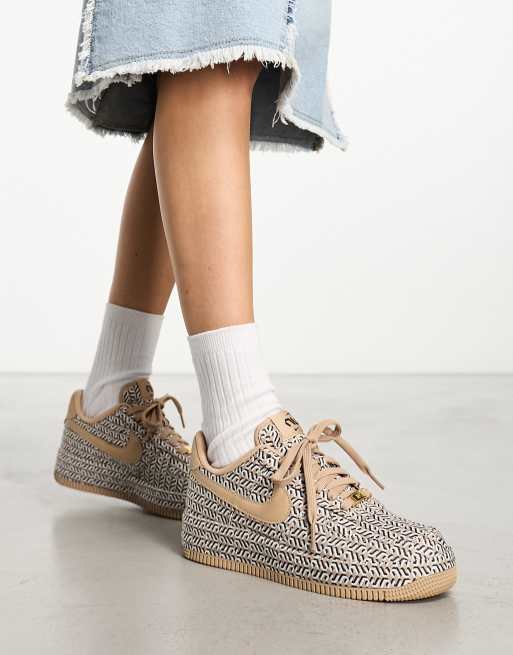 Nike Air Force 1 LX sneakers in brown all over print