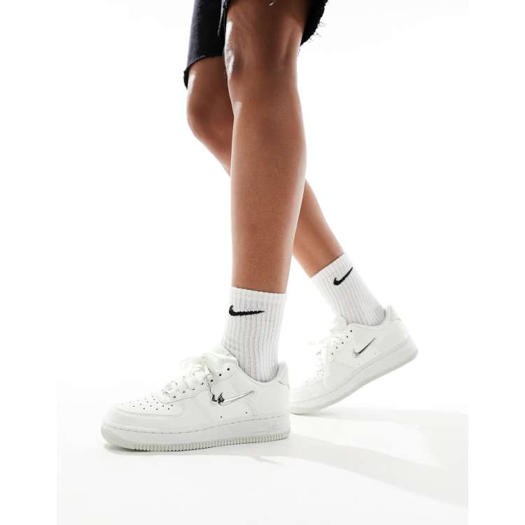 Nike Air Force 1 metallic sneakers in white ASOS