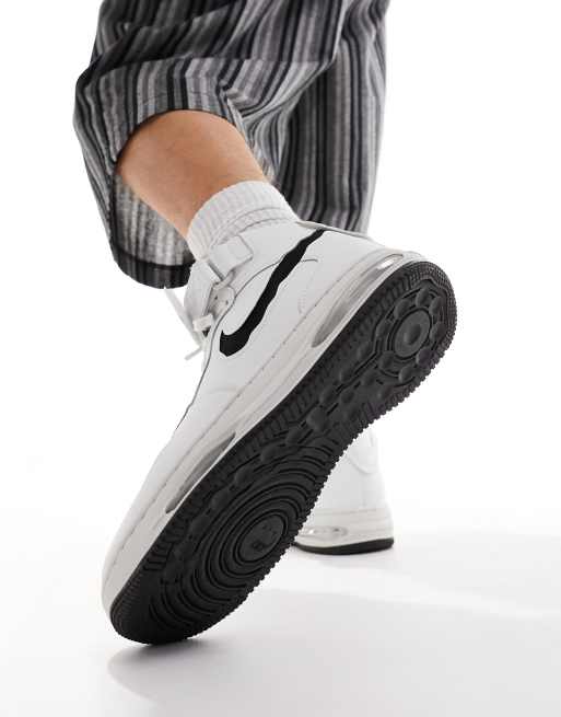 Nike Air Force 1 Mid Remastered sneakers in white and black | ASOS