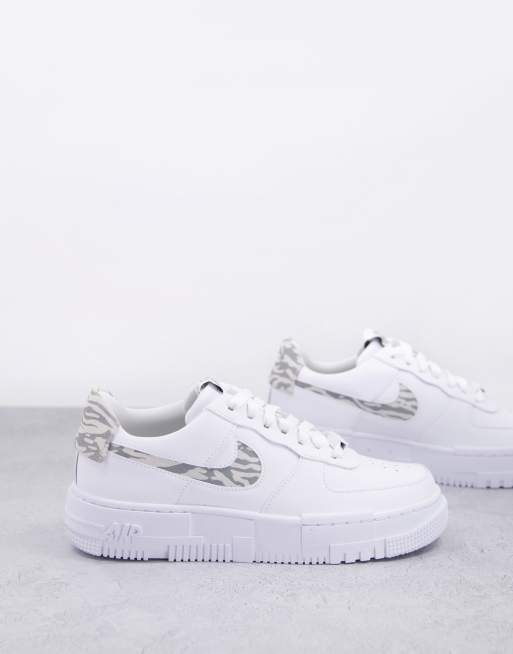 Nike Air Force 1 Pixel trainers in white and zebra print