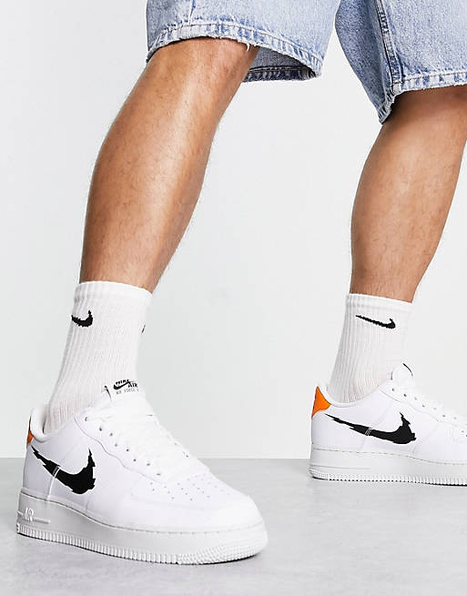 bracket Melodrama Integral Nike Air Force 1 SE trainers in white with black swoosh | ASOS