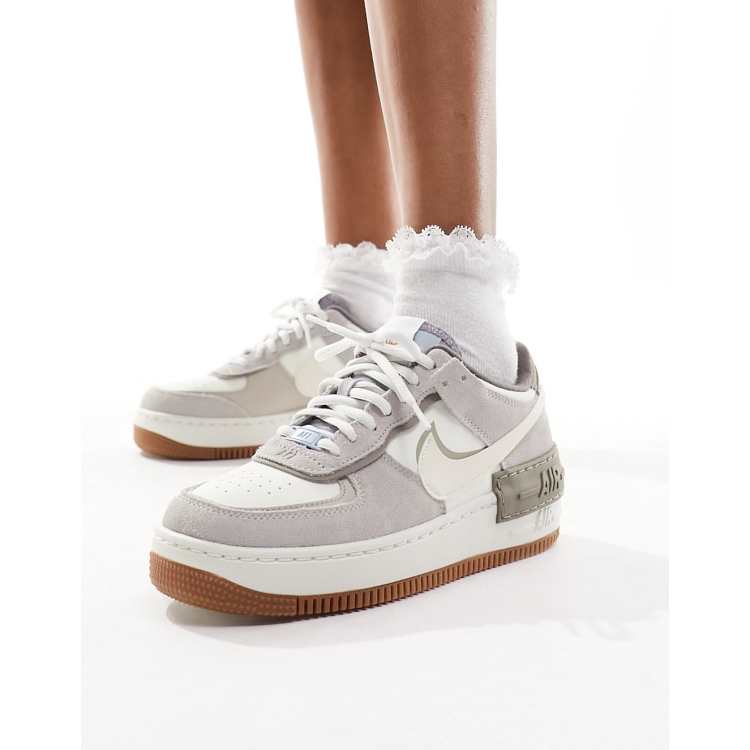 Nike Air Force 1 Shadow sneakers in white and gray