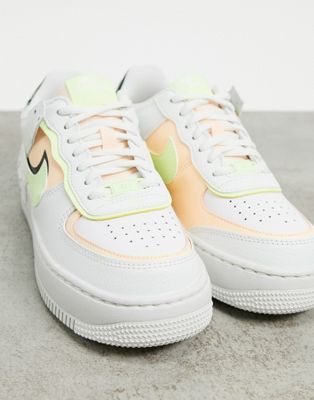 black pink and green air force ones