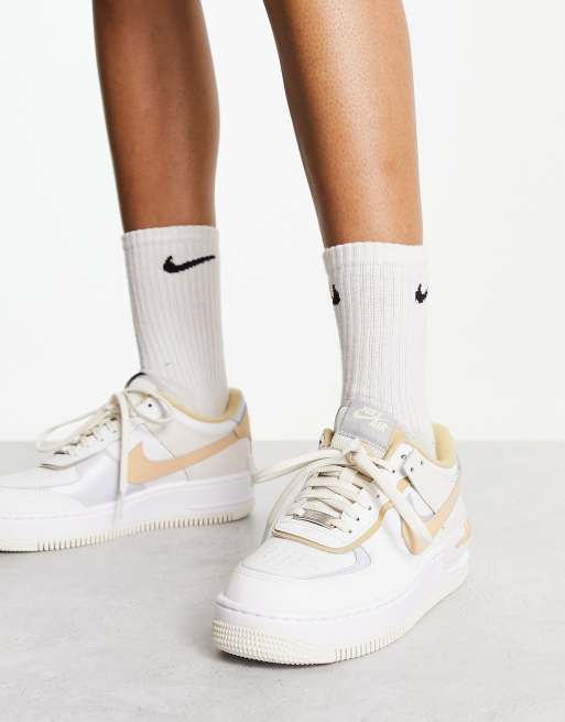 Nike Air Force 1 Shadow sneakers in white and gray