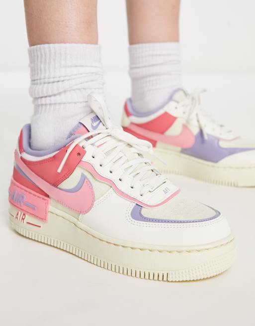 Nike Air Force 1 Shadow sneakers in white and pink